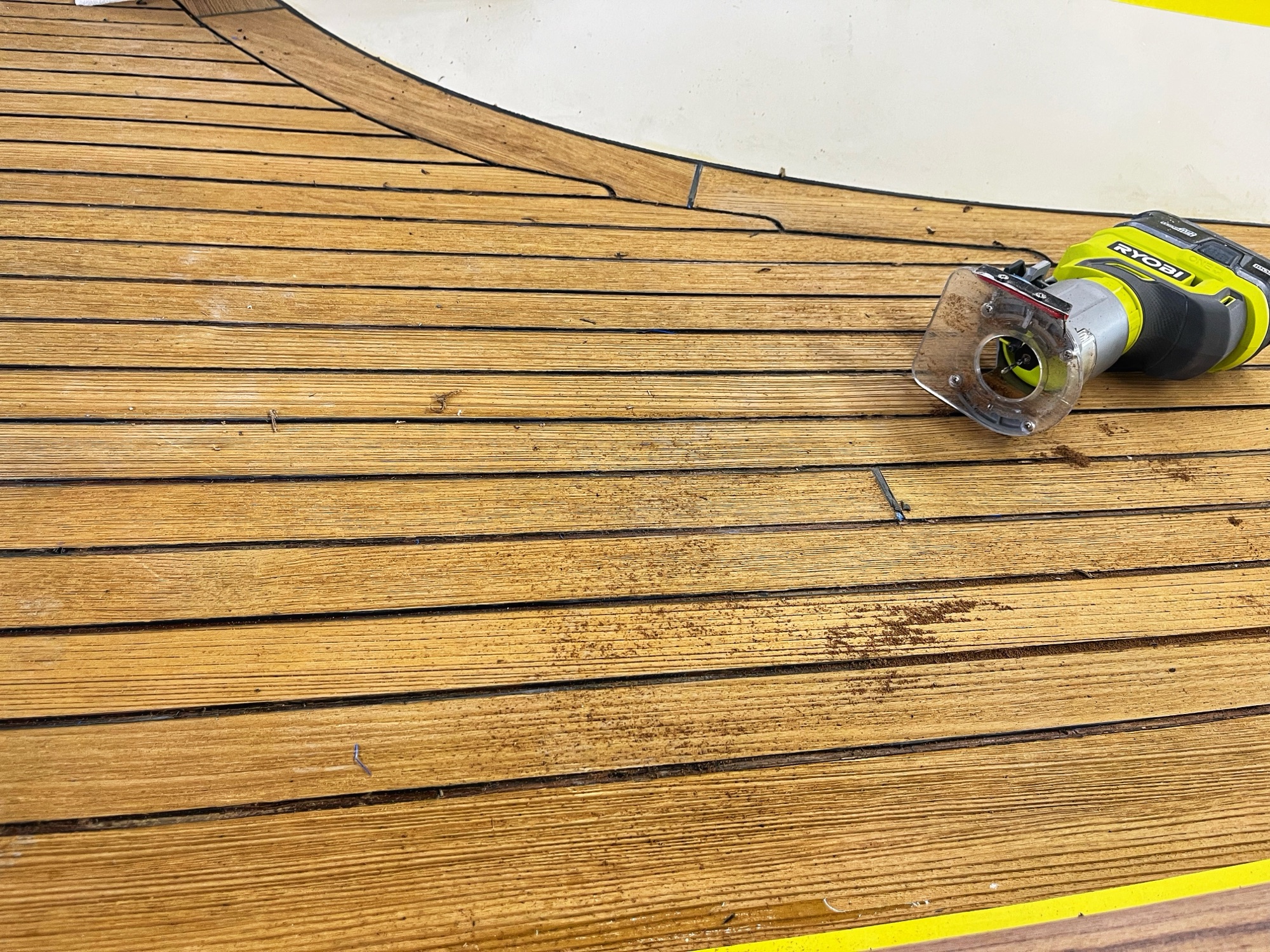 Deck Re-seam, Brightwork Re-varnish, Boom Re-paint